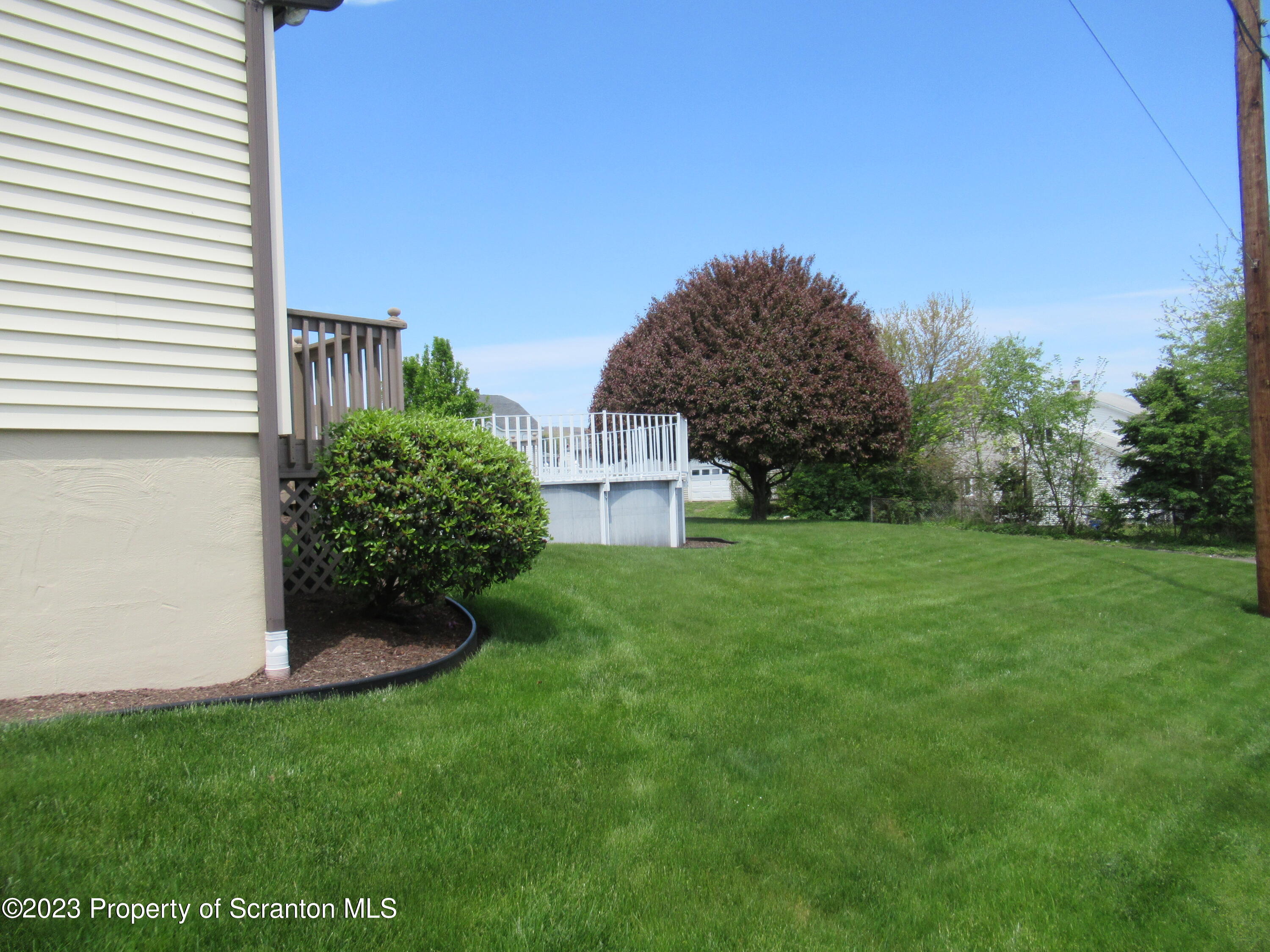 602 Eynon Street Scranton, PA 18504 - Photo 79 of 80 a view of a house with a yard and sitting area