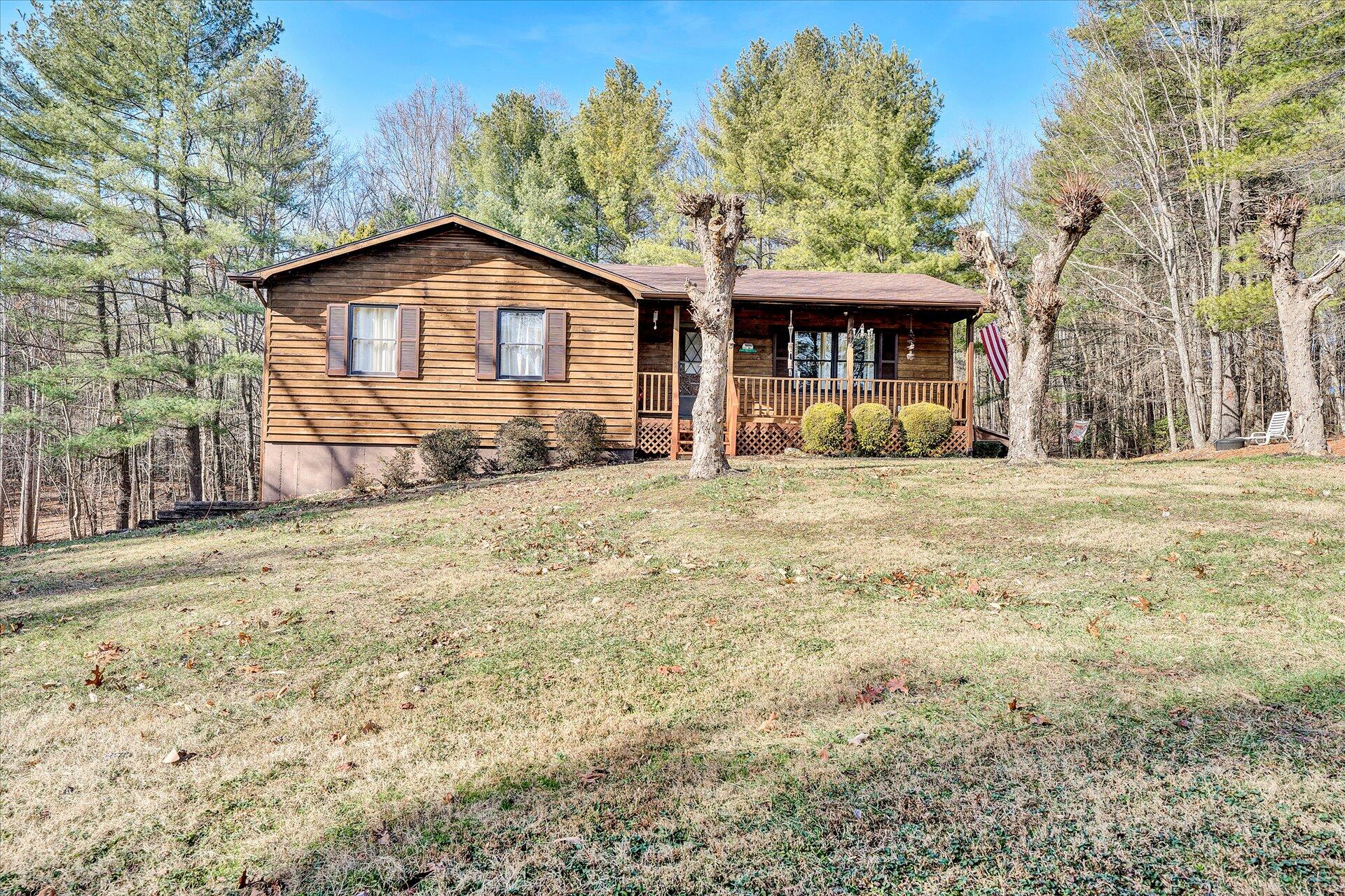 98 Sunset Ridge Road Callaway, VA 24067 - Photo 1 of 32 a front view of a house with a yard