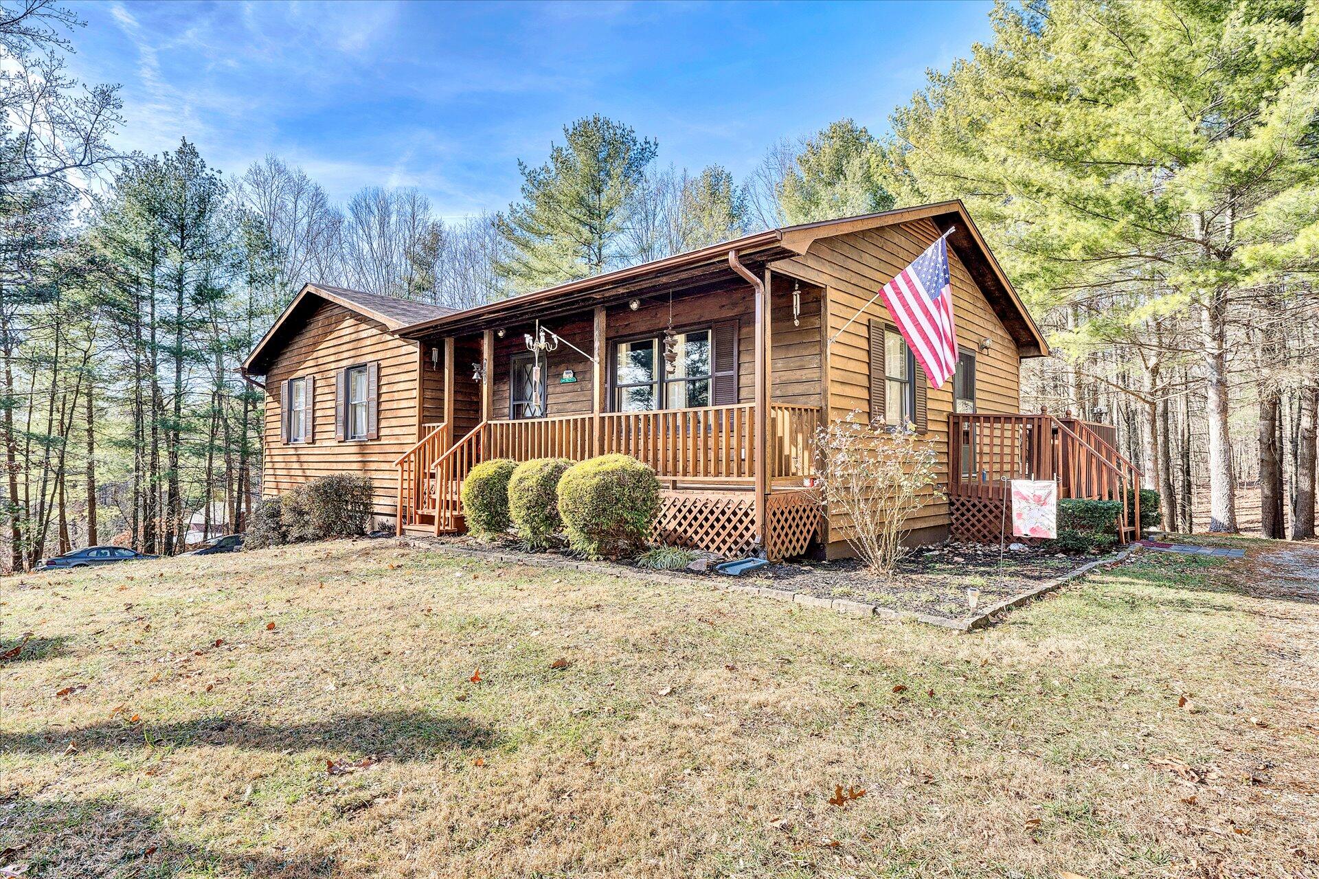 98 Sunset Ridge Road Callaway, VA 24067 - Photo 2 of 32 a view of a house with a yard covered in snow