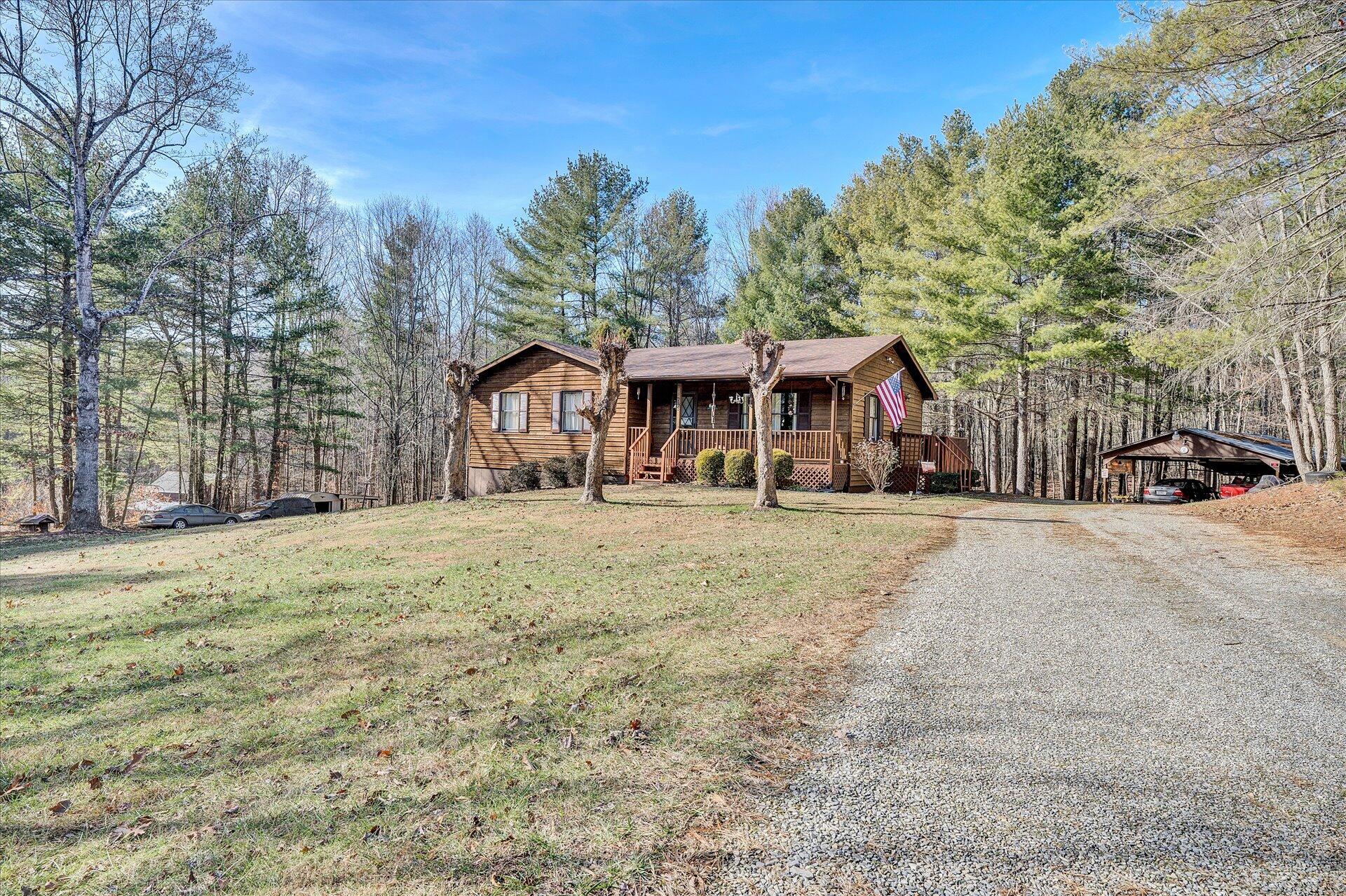 98 Sunset Ridge Road Callaway, VA 24067 - Photo 3 of 32 a front view of a building with trees