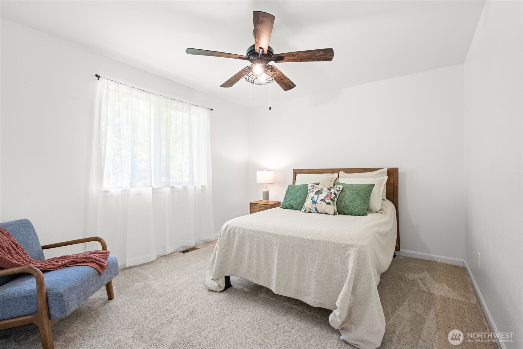 401 East Sunset Ridge Road Union, WA 98592 - Photo 18 of 37 a bedroom with a bed and window