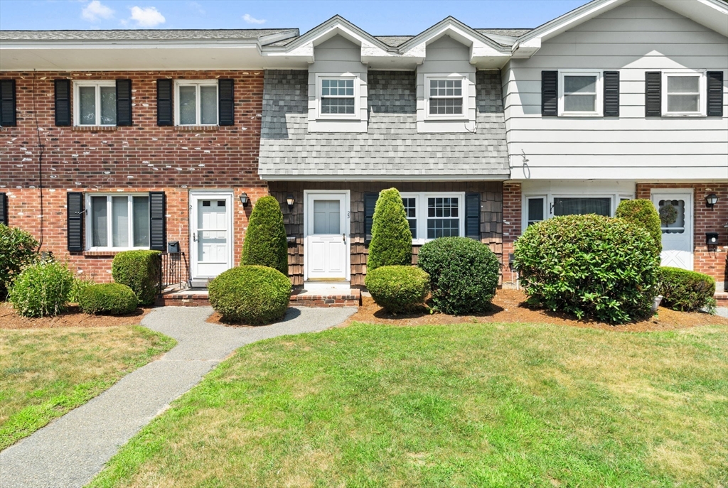 23 Constitution Way, Unit 23 Methuen, MA 01844 - Photo 1 of 21 a view of a house with yard and plants