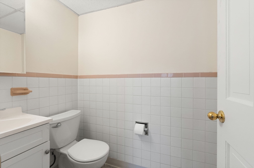 23 Constitution Way, Unit 23 Methuen, MA 01844 - Photo 9 of 21 a white toilet sitting next to a white sink