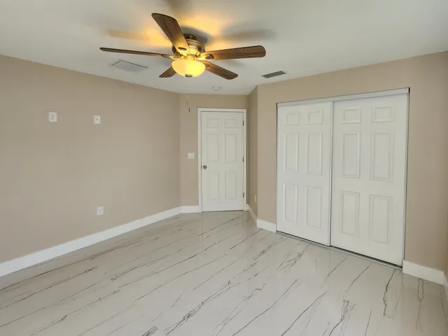 a bathroom with a sink a vanity and a mirror