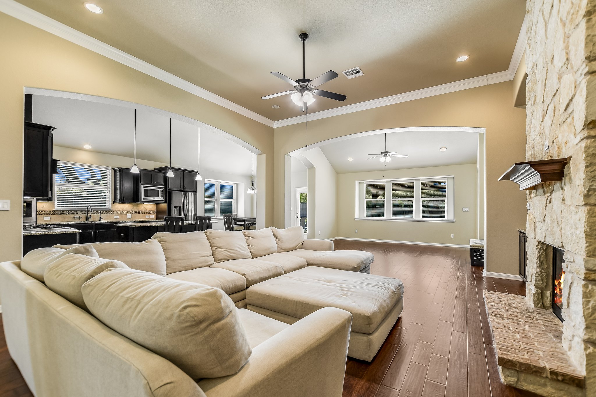 2037 Tribal Way Leander, TX 78641 - Photo 5 of 14 This oversized family room easily accommodates this oversized sofa, which can be included in the lease
