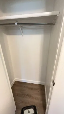 a room with a hardwood and a sink