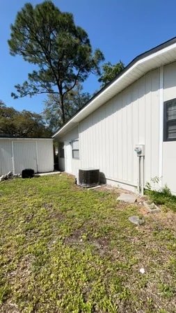 a house view with a backyard space