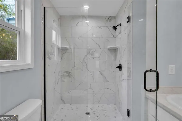 a view of lake and mountain