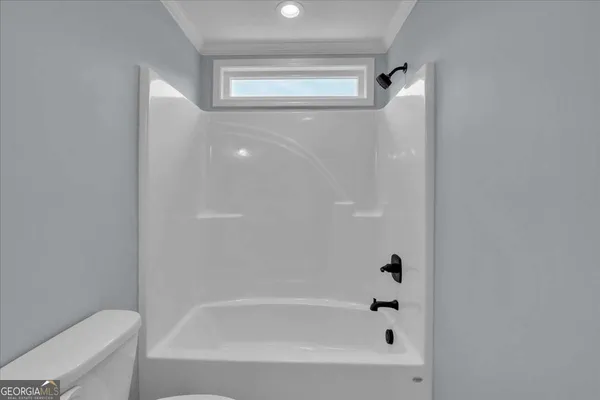 a aerial view of a house with a yard