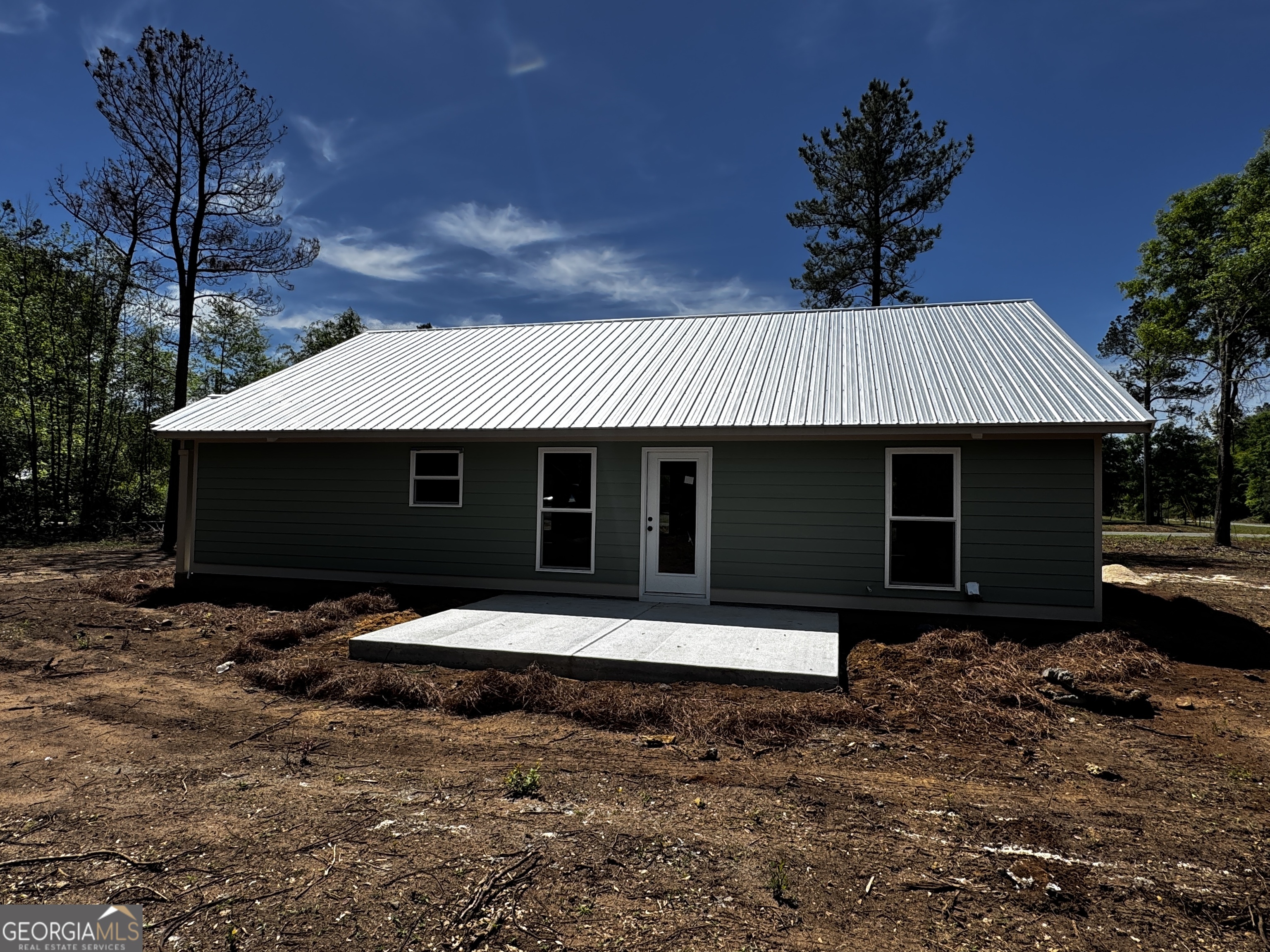 27 Bluegill Road Vienna, GA 31092 - Photo 51 of 68 a front view of house with yard and trees in the background