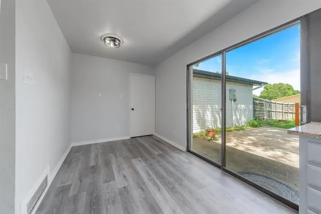 a view of an empty room and window