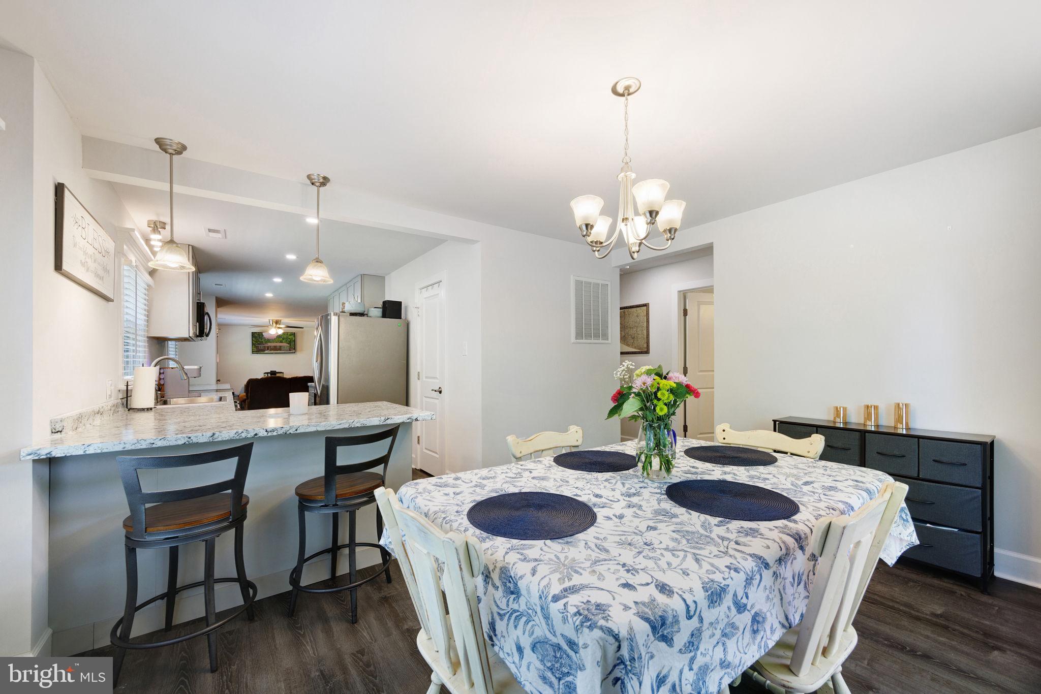 919 Chalklevel Road Louisa, VA 23093 - Photo 12 of 32 a view of a dining room with furniture and wooden floor