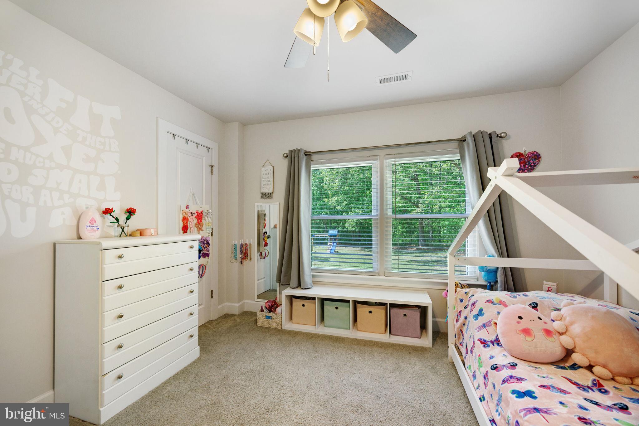 919 Chalklevel Road Louisa, VA 23093 - Photo 19 of 32 a bedroom with a bed and a window