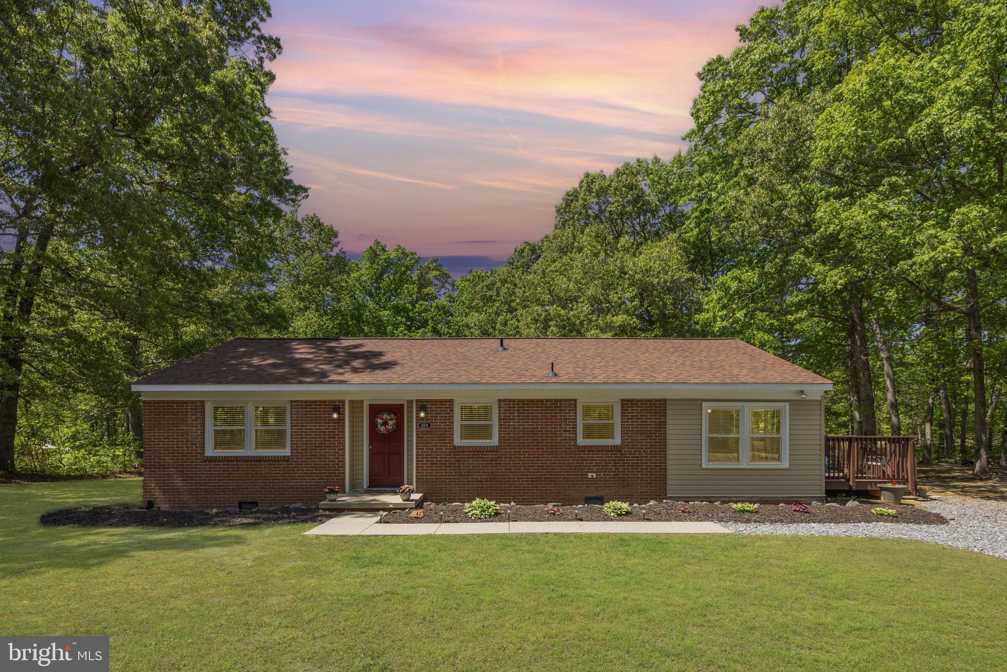 919 Chalklevel Road Louisa, VA 23093 - Photo 2 of 32 a front view of a house with garden