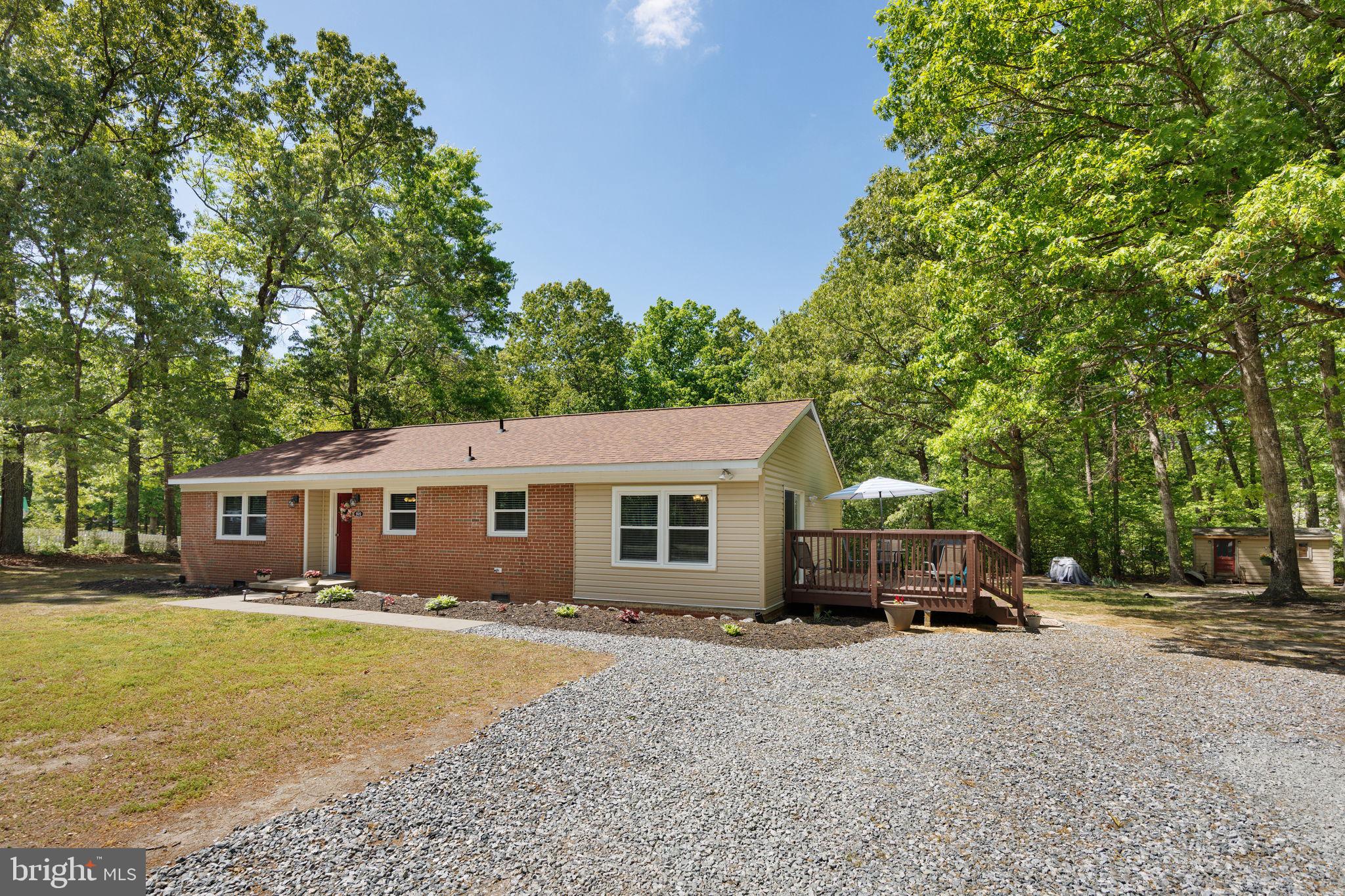 919 Chalklevel Road Louisa, VA 23093 - Photo 4 of 32 a house view with a garden space