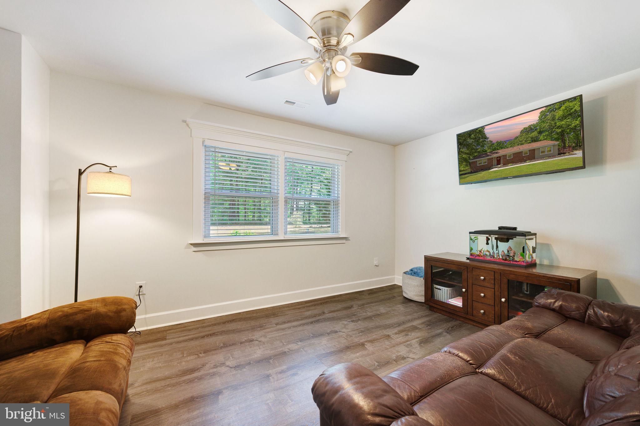 919 Chalklevel Road Louisa, VA 23093 - Photo 7 of 32 a living room with furniture and a window