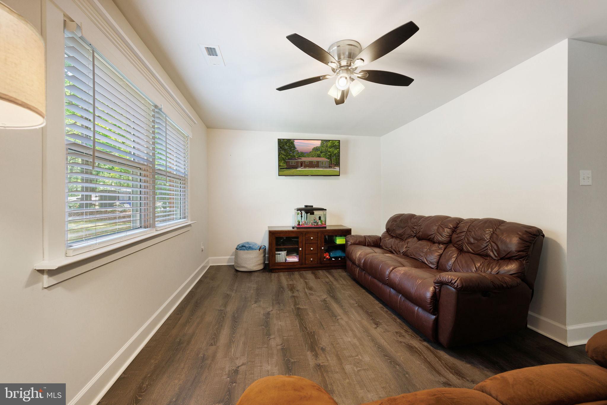 919 Chalklevel Road Louisa, VA 23093 - Photo 8 of 32 a living room with furniture and a window