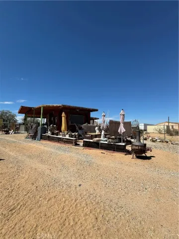 a view of a road with a building in the background