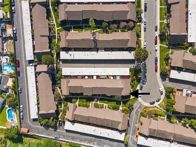 an aerial view of a house with a garden