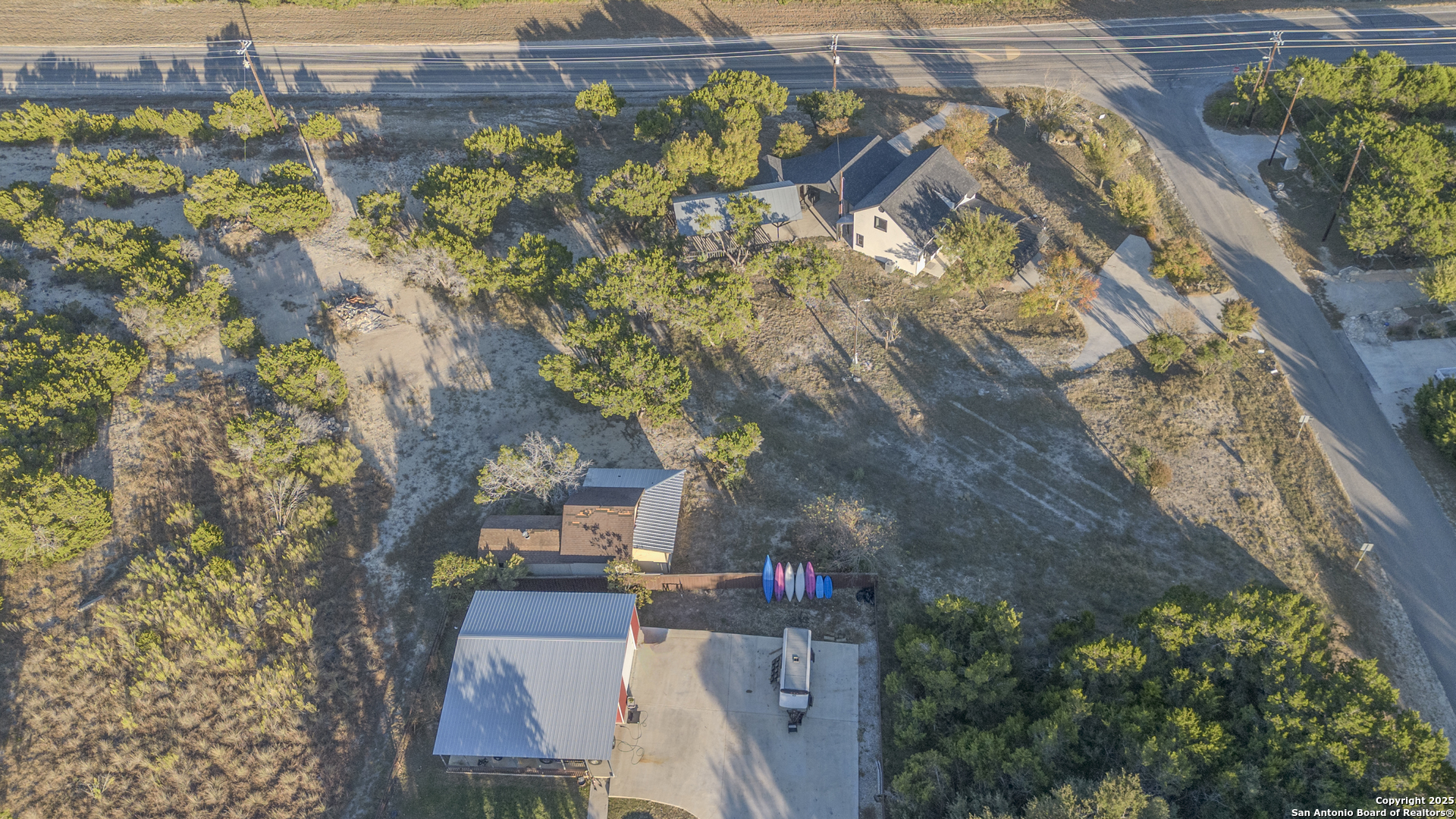 Tbd Rocky Ranch Canyon Lake, TX 78133 - Photo 12 of 18 an aerial view of a house with a yard