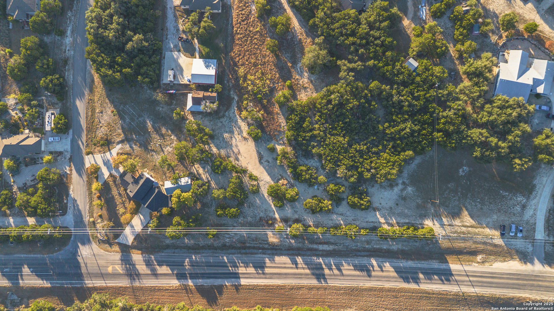 Tbd Rocky Ranch Canyon Lake, TX 78133 - Photo 16 of 18 a view of building with trees