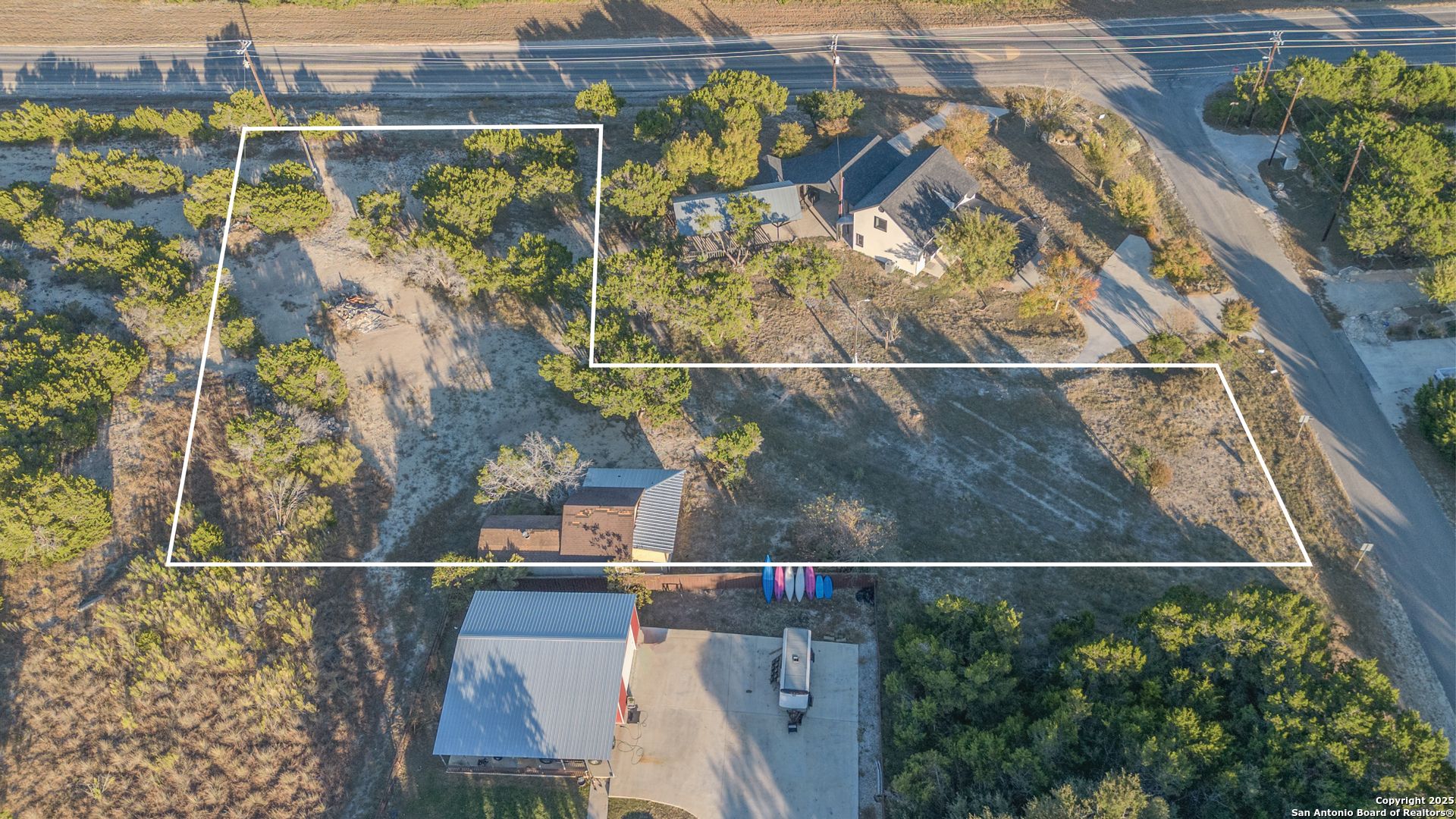 Tbd Rocky Ranch Canyon Lake, TX 78133 - Photo 3 of 18 an aerial view of houses with yard