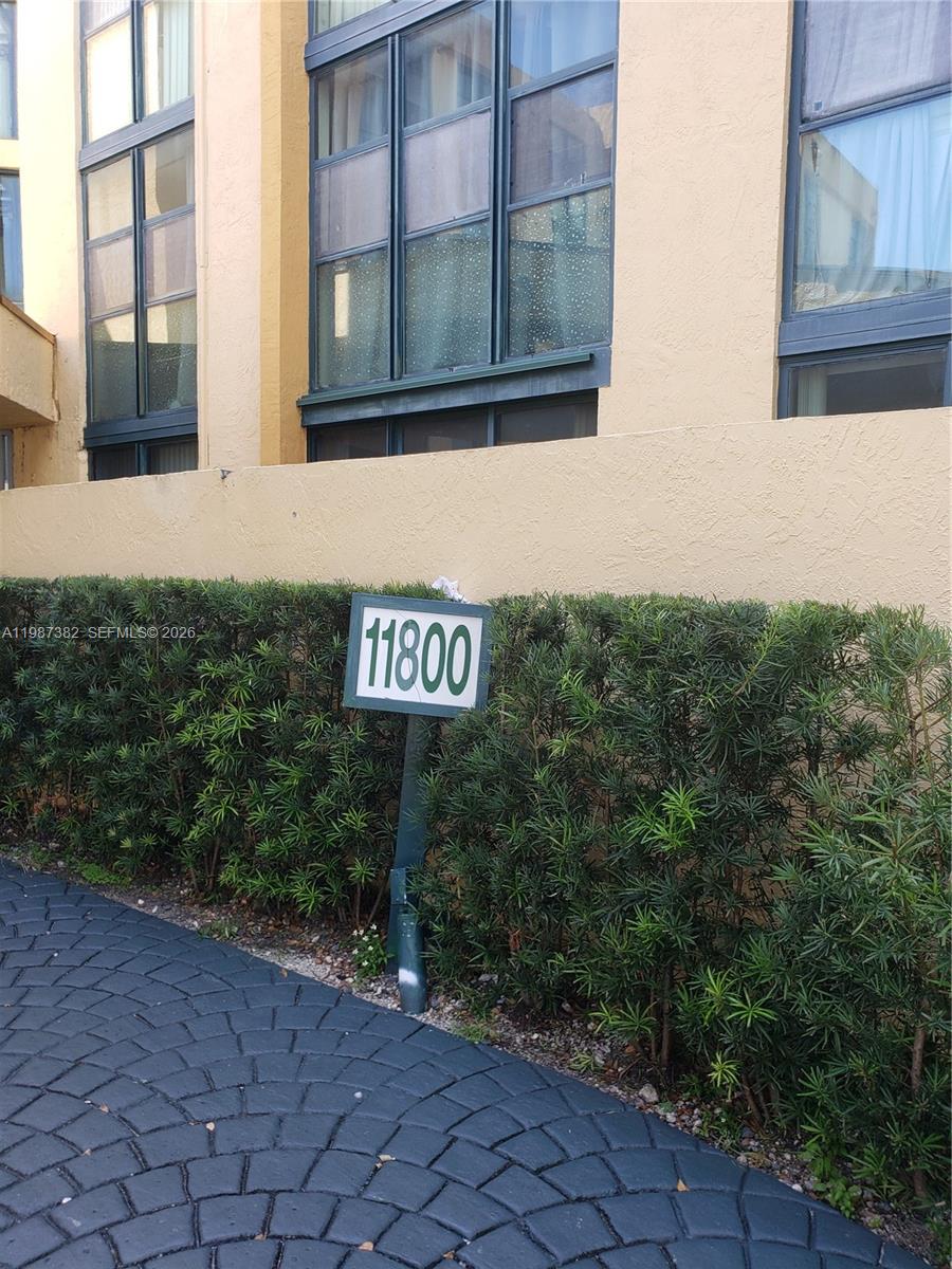 11800 Southwest 18th Street, Unit 3274 Miami, FL 33175 - Photo 2 of 23 a view of a street sign of the house