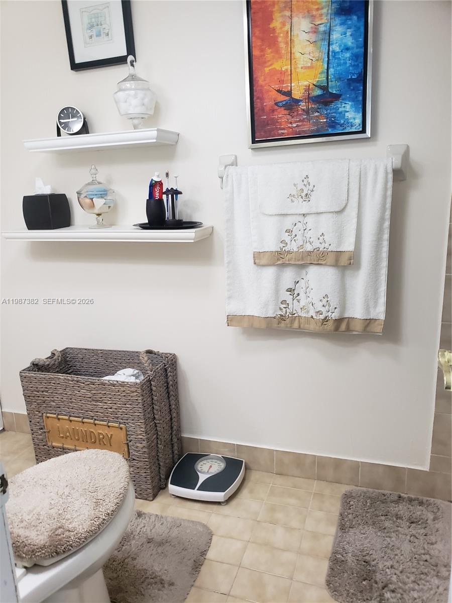 11800 Southwest 18th Street, Unit 3274 Miami, FL 33175 - Photo 23 of 23 a room with a rug and wooden floor