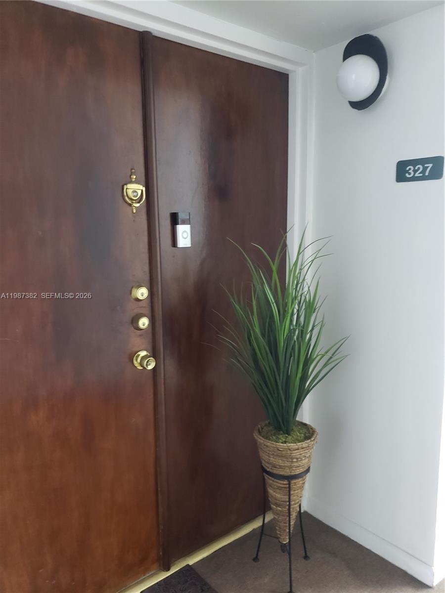 11800 Southwest 18th Street, Unit 3274 Miami, FL 33175 - Photo 6 of 23 a view of a potted plant with a window