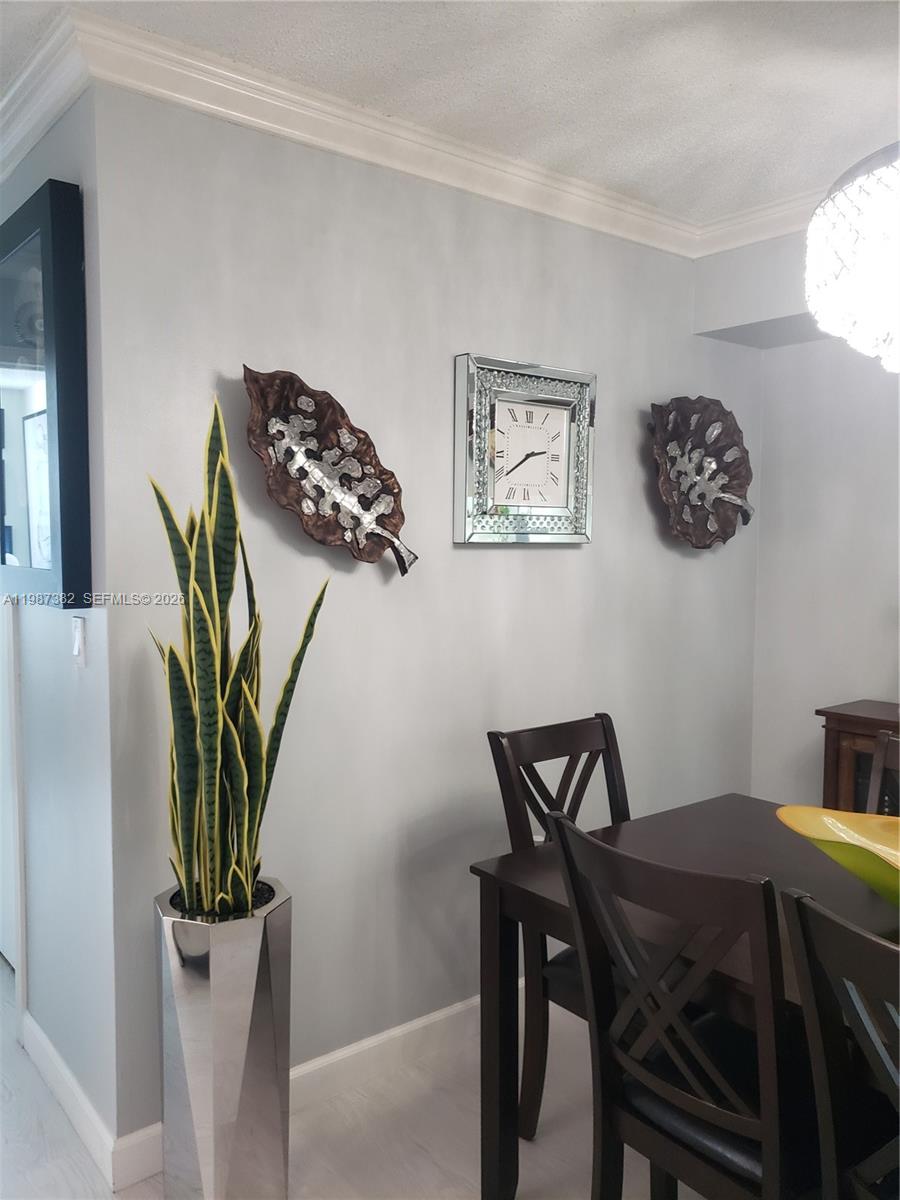 11800 Southwest 18th Street, Unit 3274 Miami, FL 33175 - Photo 10 of 23 a view of a dining room with furniture