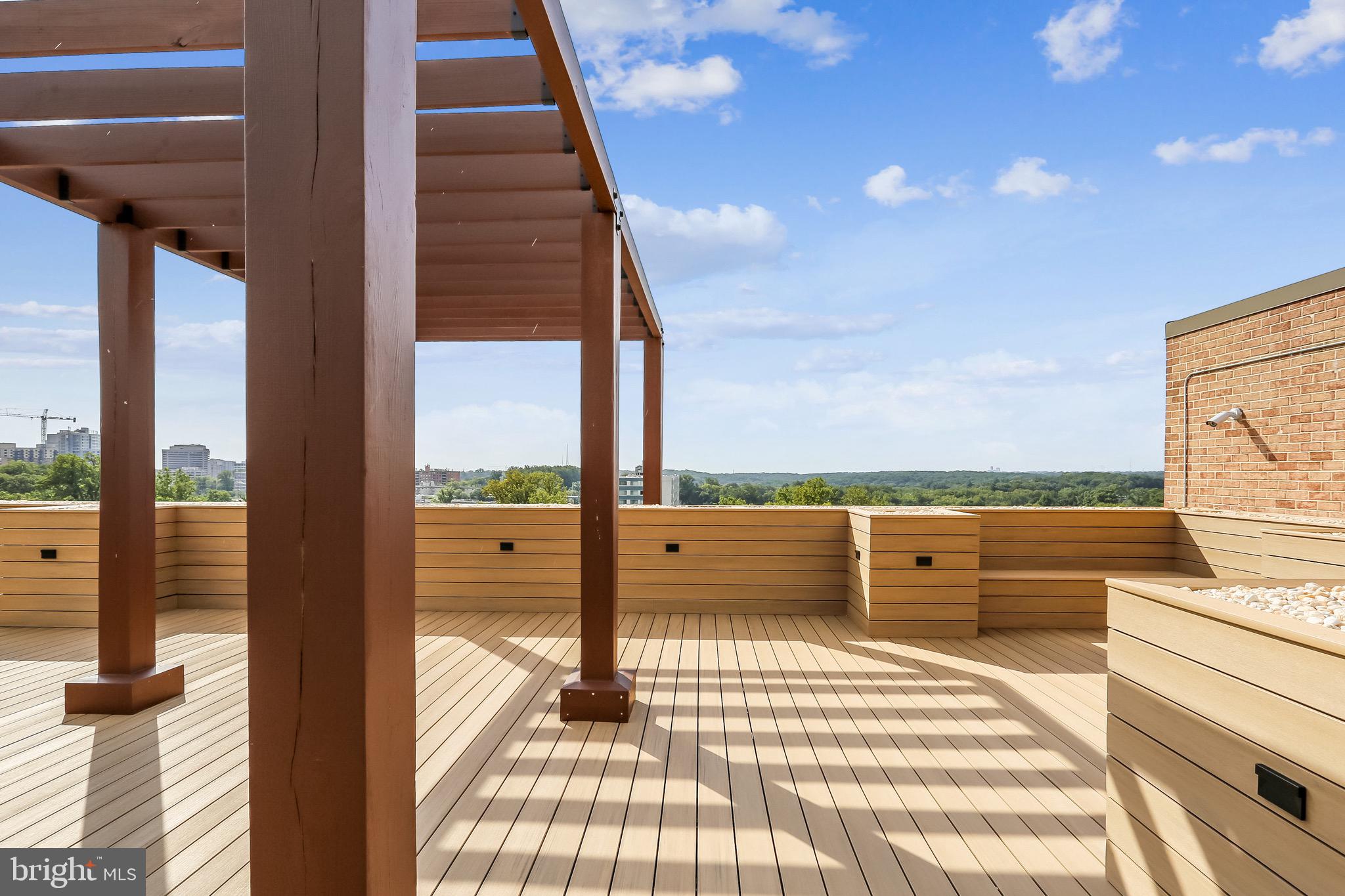1900 Lyttonsville Road, Unit 802 Silver Spring, MD 20910 - Photo 15 of 38 a view of a balcony with city view
