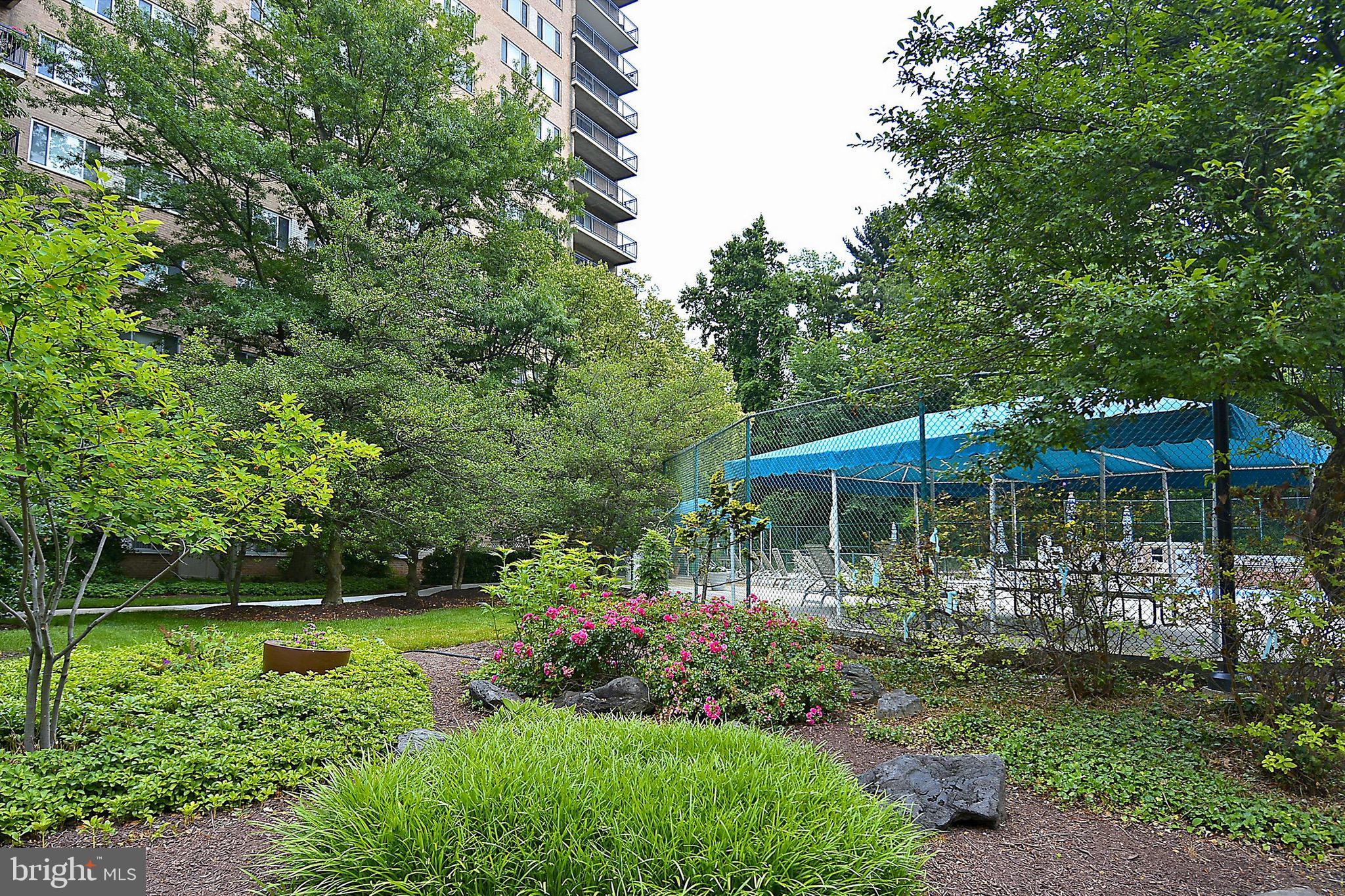 1900 Lyttonsville Road, Unit 802 Silver Spring, MD 20910 - Photo 19 of 38 a view of a house with a yard