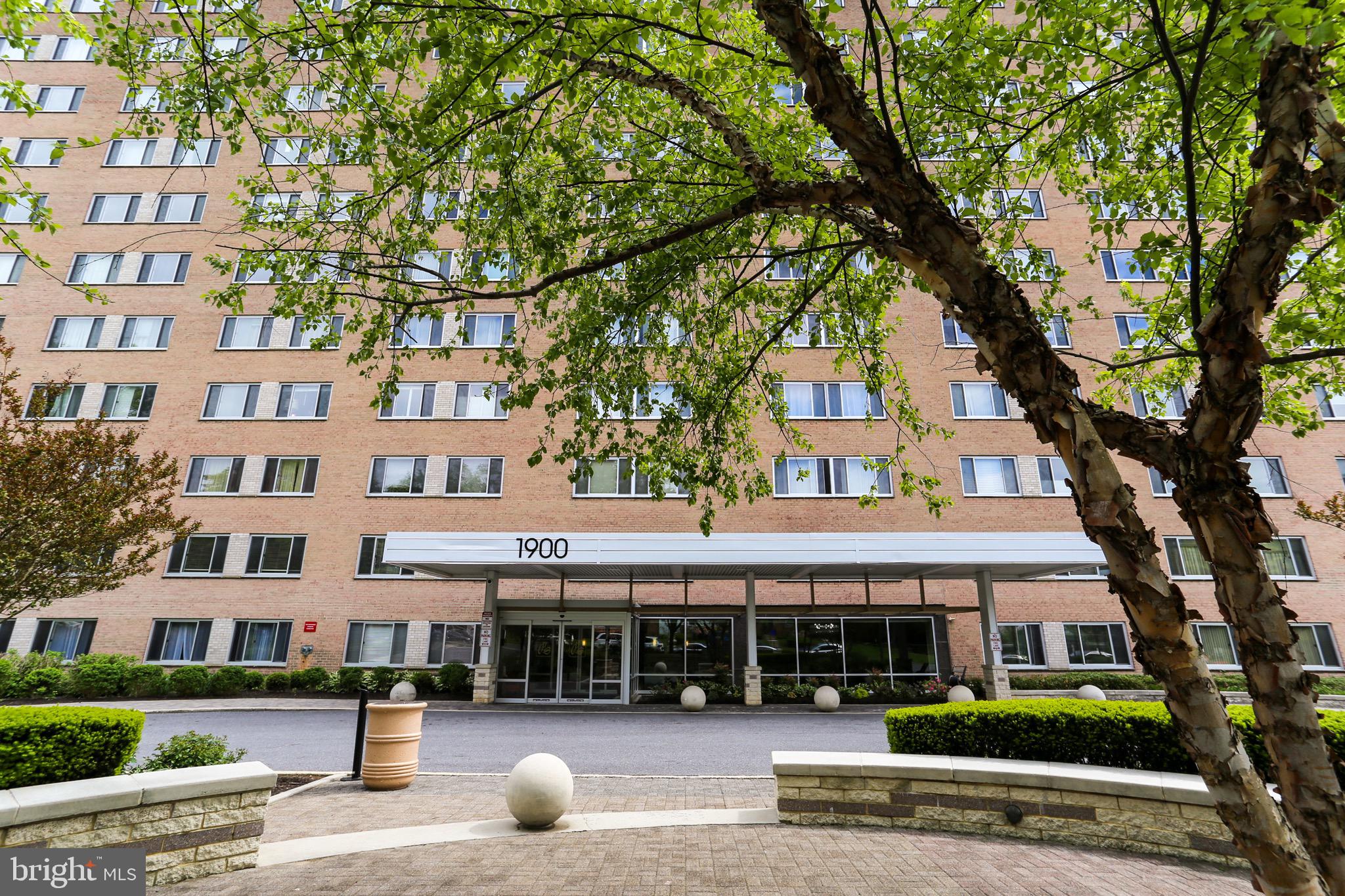 1900 Lyttonsville Road, Unit 802 Silver Spring, MD 20910 - Photo 2 of 38 a view of a building with a garden