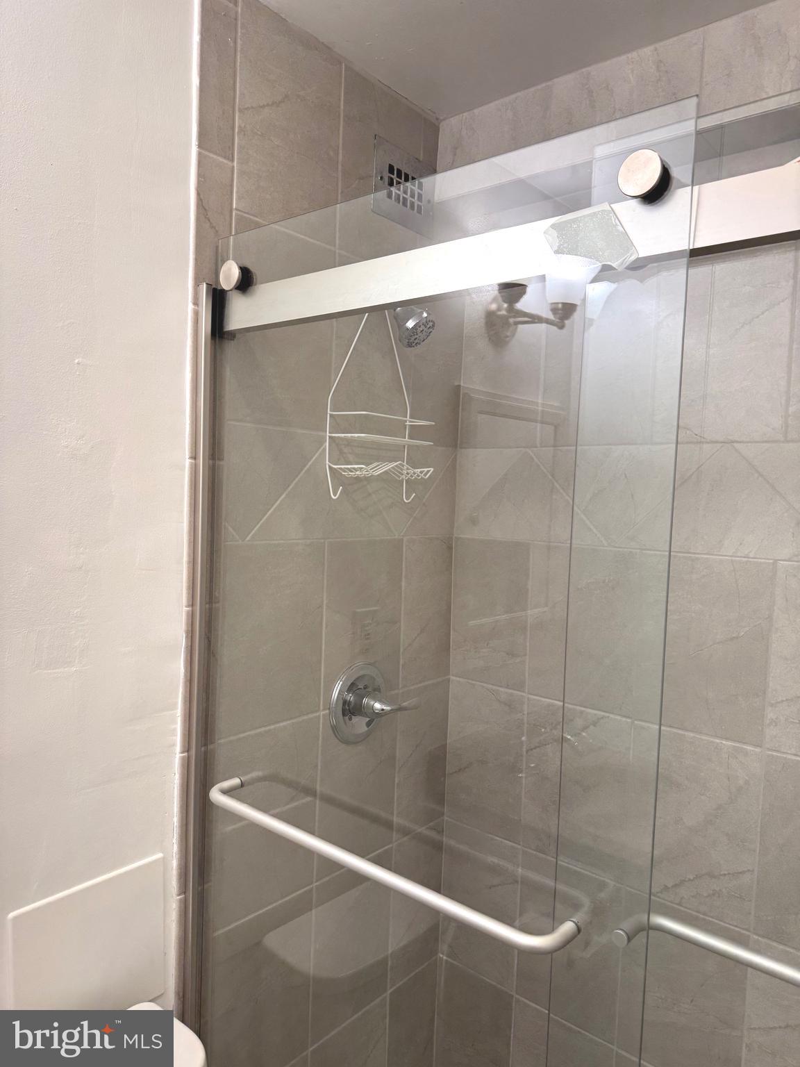 1900 Lyttonsville Road, Unit 802 Silver Spring, MD 20910 - Photo 38 of 38 a bathroom with a shower