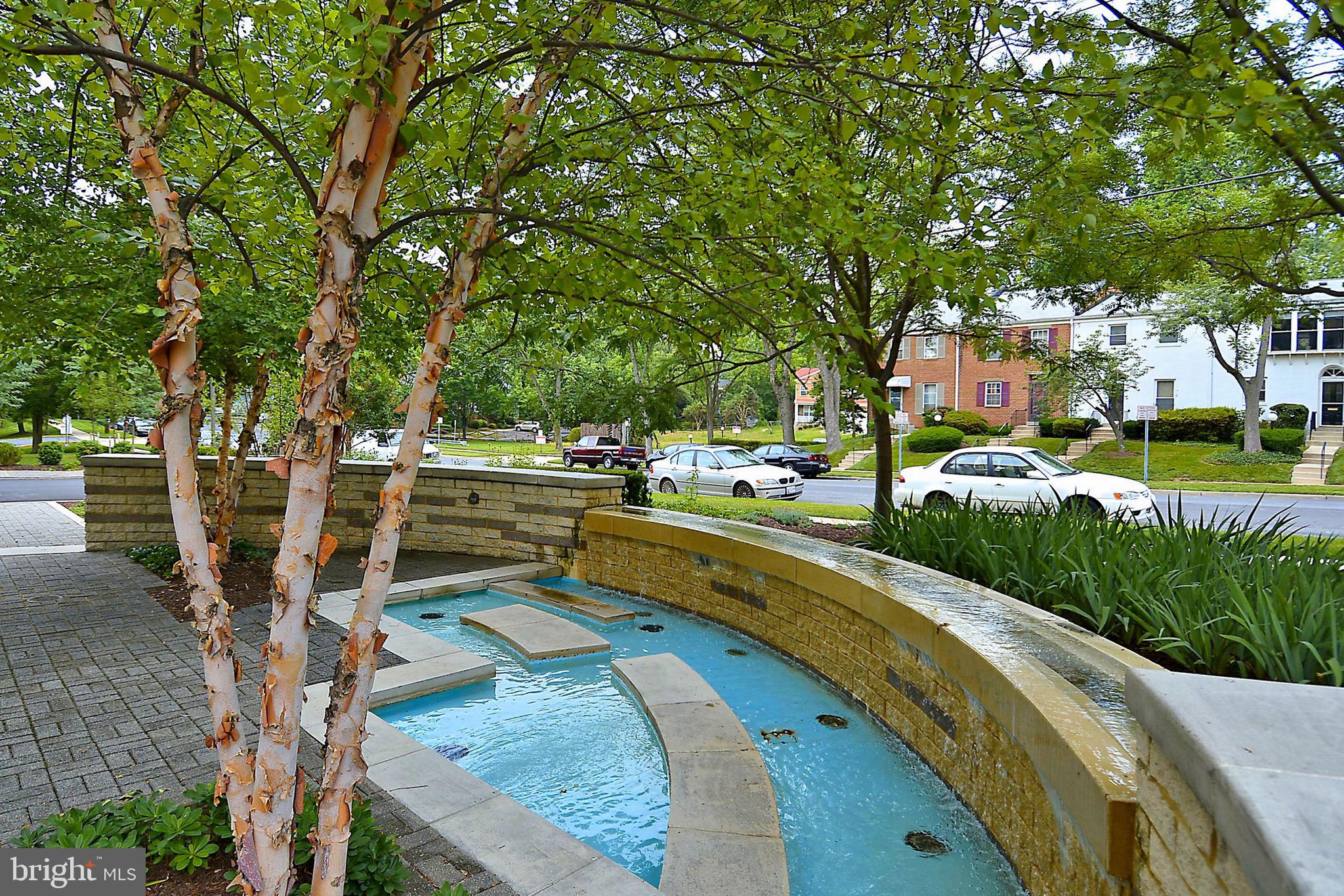 1900 Lyttonsville Road, Unit 802 Silver Spring, MD 20910 - Photo 5 of 38 a view of a park with large trees
