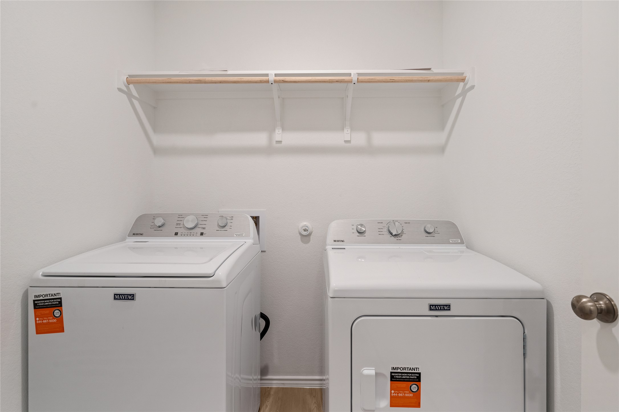 115 Parsons Kyle, TX 78640 - Photo 12 of 18 Functional utility space with convenient laundry facilities.