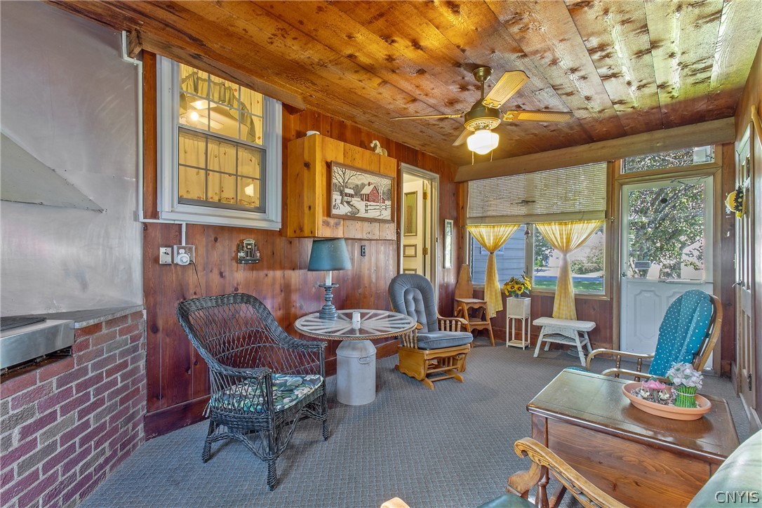 225 Kasson Road Camillus, NY 13031 - Photo 32 of 43 Sunroom/Breezeway is the perfect spot to enjoy a s