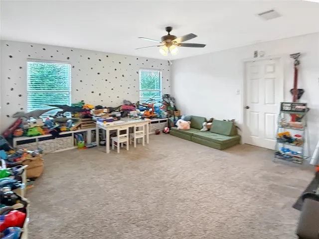 a room with furniture and a chandelier
