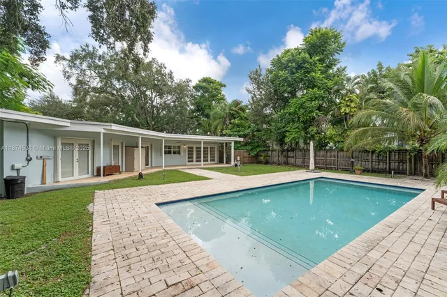 a view of a house with a swimming pool