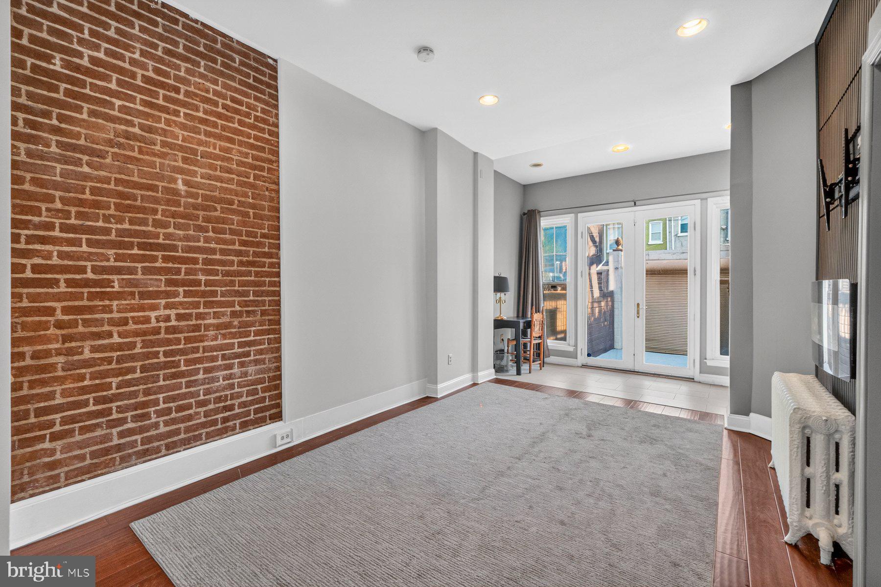 19 R Street Northwest, Unit A Washington, DC 20001 - Photo 14 of 37 Main level flex / bedroom access to parking/patio