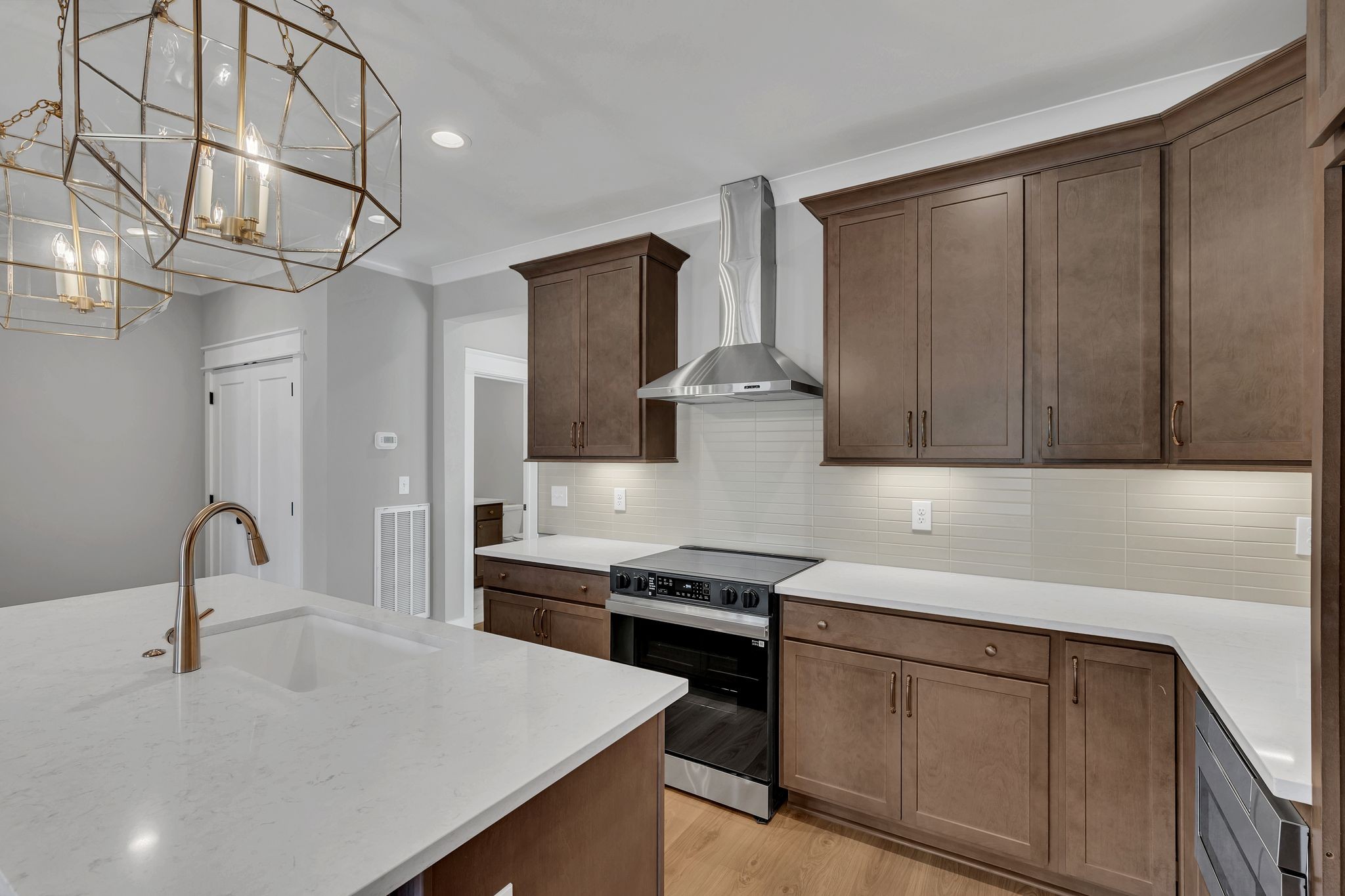 520 North Maple Street, Unit 2 Murfreesboro, TN 37130 - Photo 15 of 34 a kitchen with stainless steel appliances a sink stove and cabinets