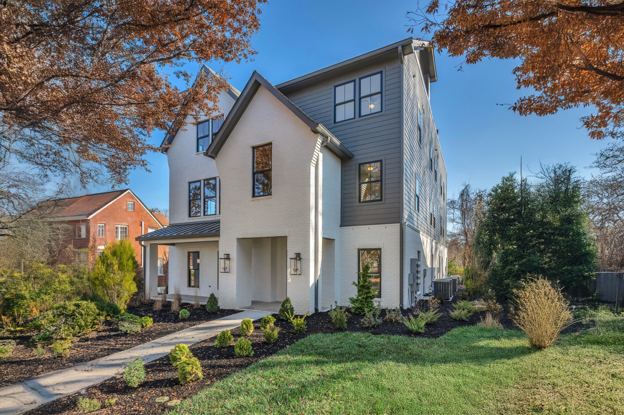 520 North Maple Street, Unit 2 Murfreesboro, TN 37130 - Photo 2 of 34 a front view of a house with garden