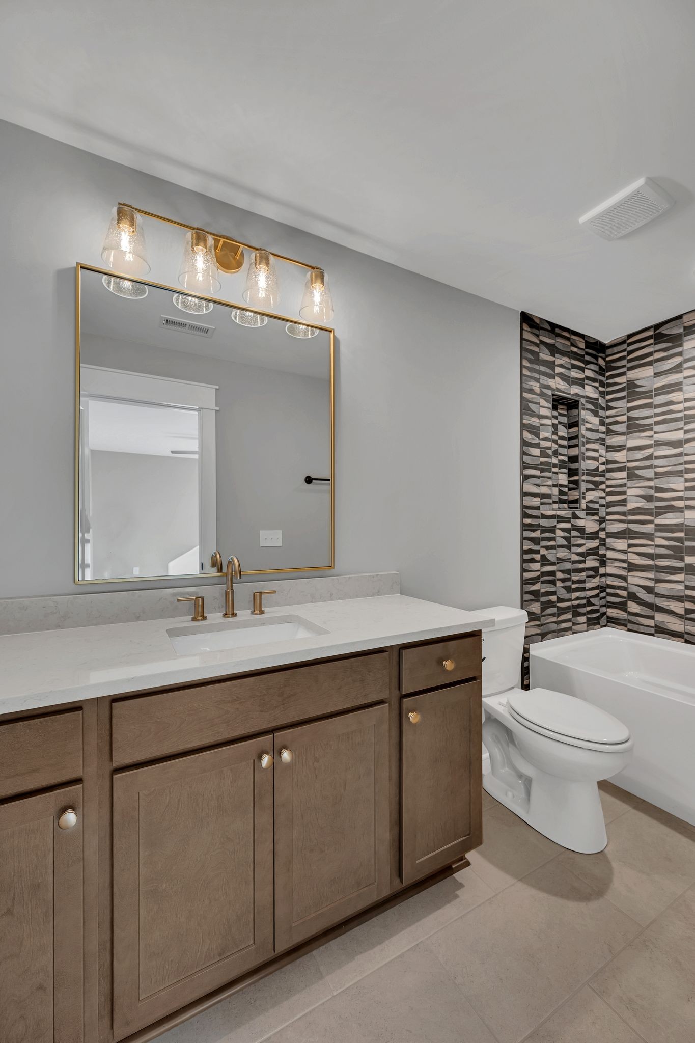 520 North Maple Street, Unit 2 Murfreesboro, TN 37130 - Photo 23 of 34 a bathroom with a toilet a sink and mirror