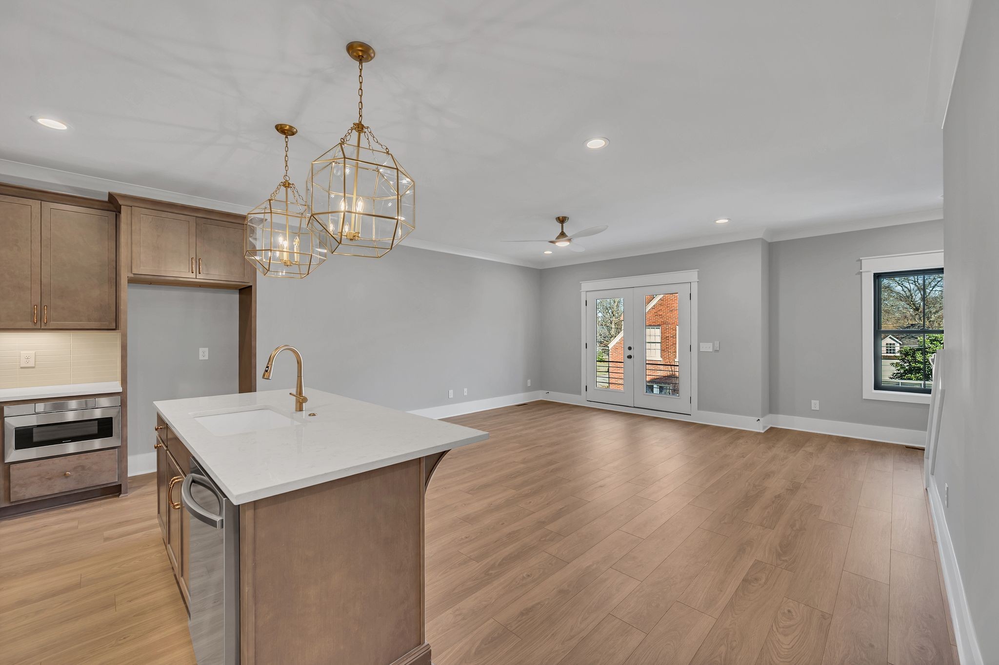 520 North Maple Street, Unit 2 Murfreesboro, TN 37130 - Photo 10 of 34 a view of a kitchen with a sink cabinetry and wooden floor