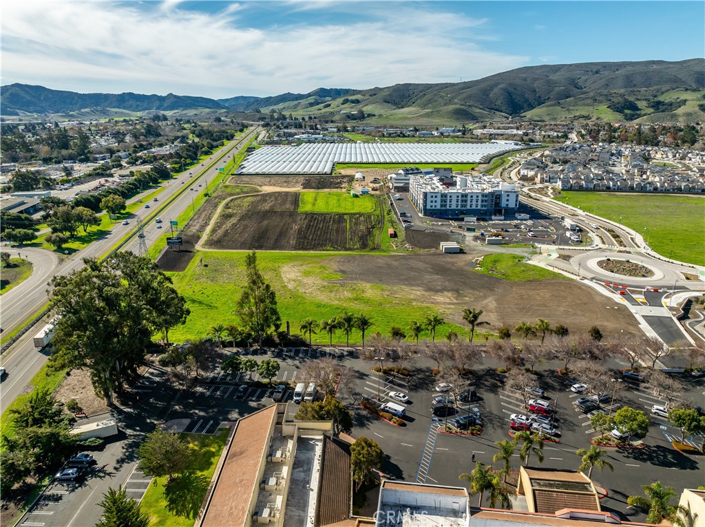 2040 Prado Road San Luis Obispo, CA 93405 - Photo 2 of 5 an aerial view of a swimming pool with a yard