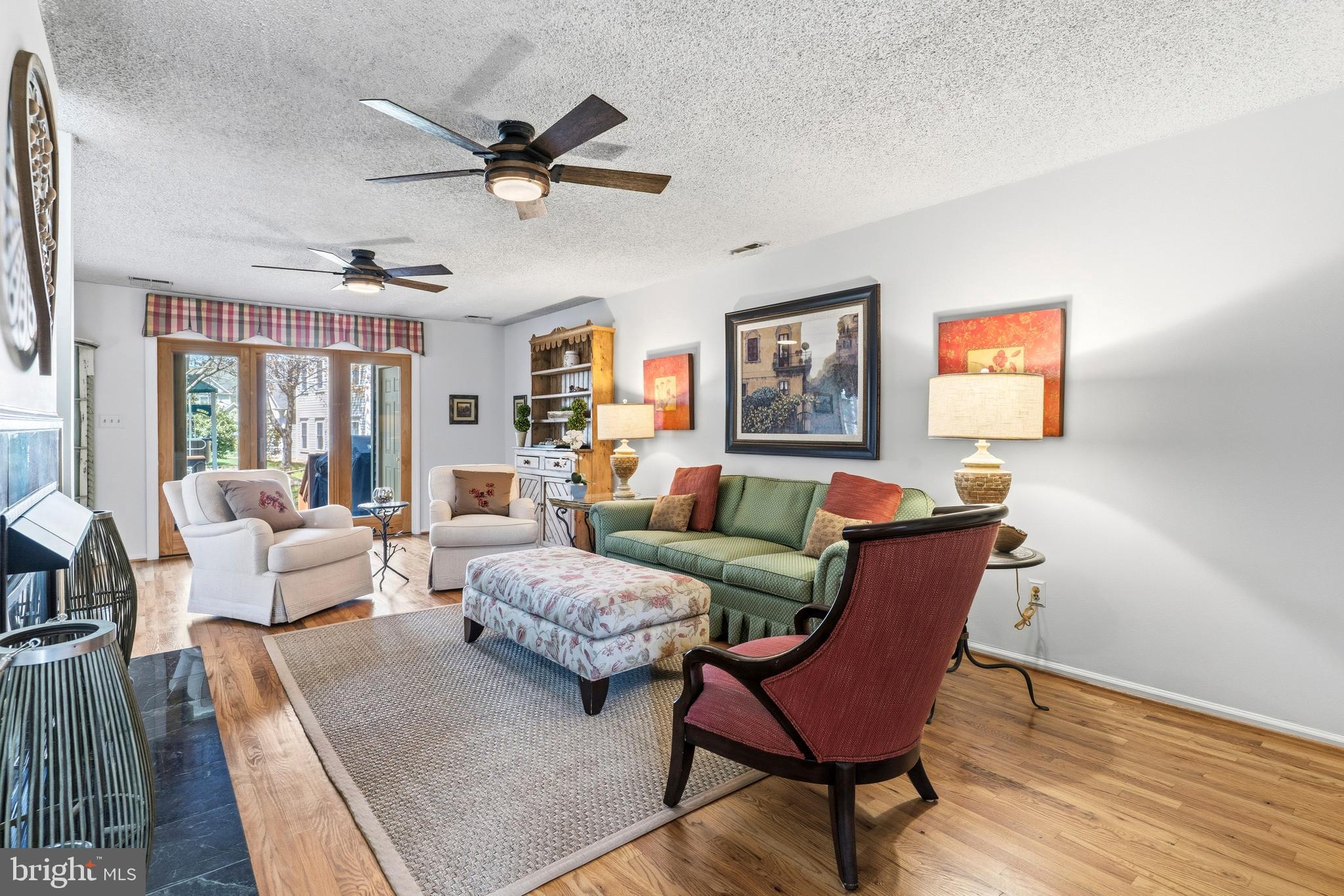 754 Bellefield Road, Unit 103 Solomons, MD 20629 - Photo 13 of 62 a living room with furniture and a large window