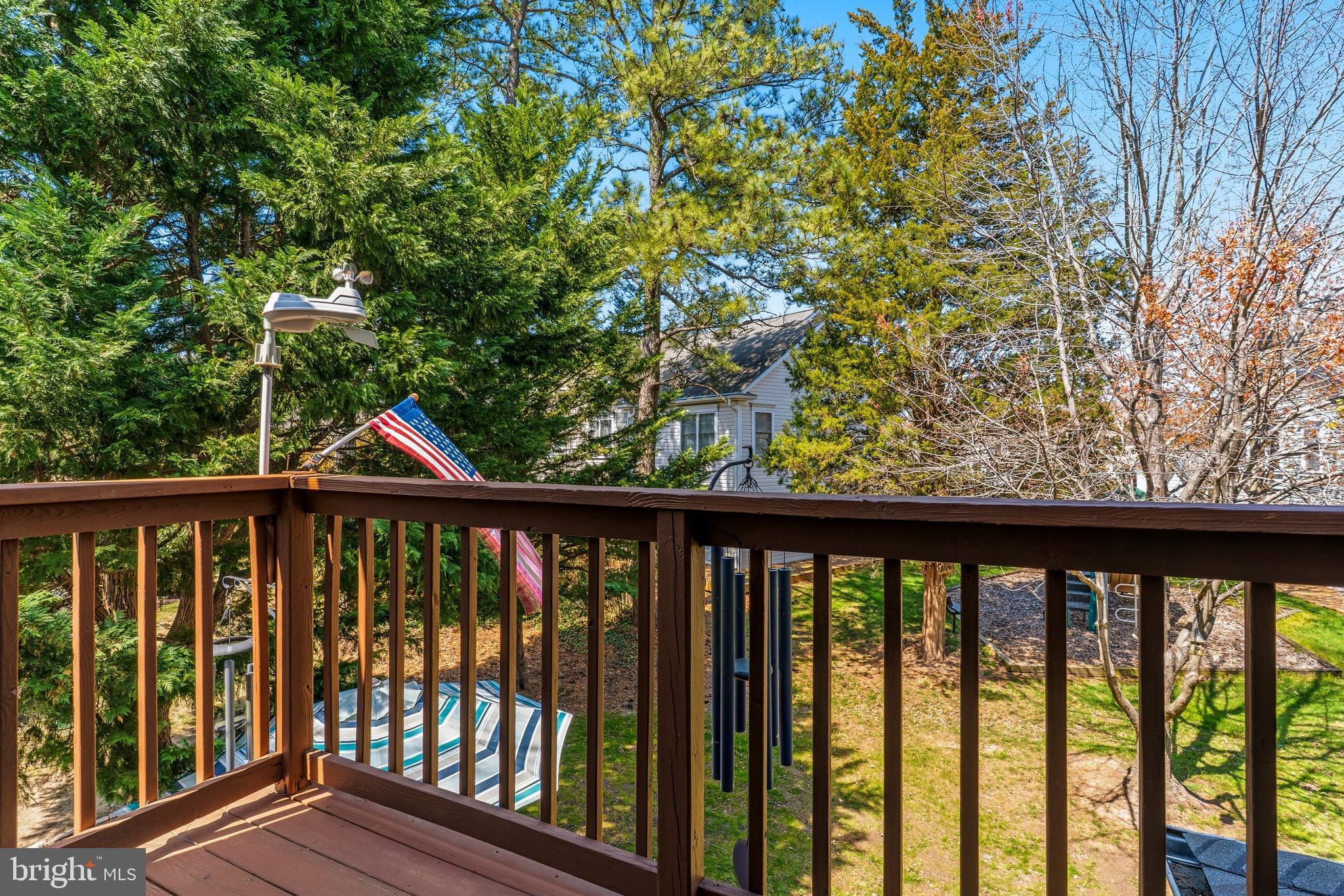 754 Bellefield Road, Unit 103 Solomons, MD 20629 - Photo 28 of 62 a view of a balcony with wooden floor