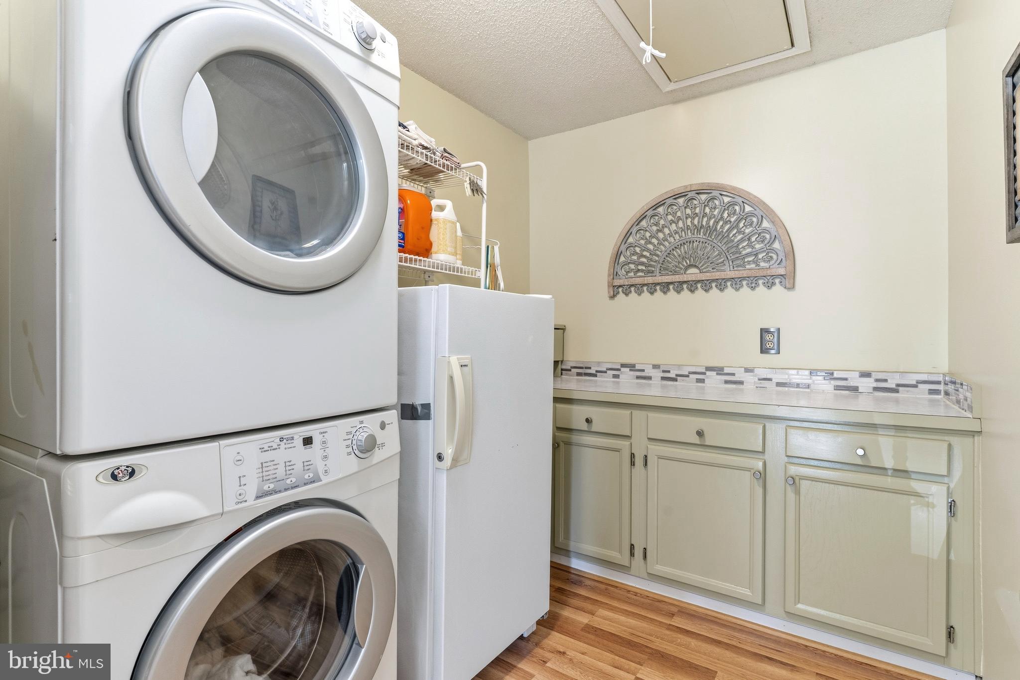 754 Bellefield Road, Unit 103 Solomons, MD 20629 - Photo 33 of 62 a room with a washer and dryer