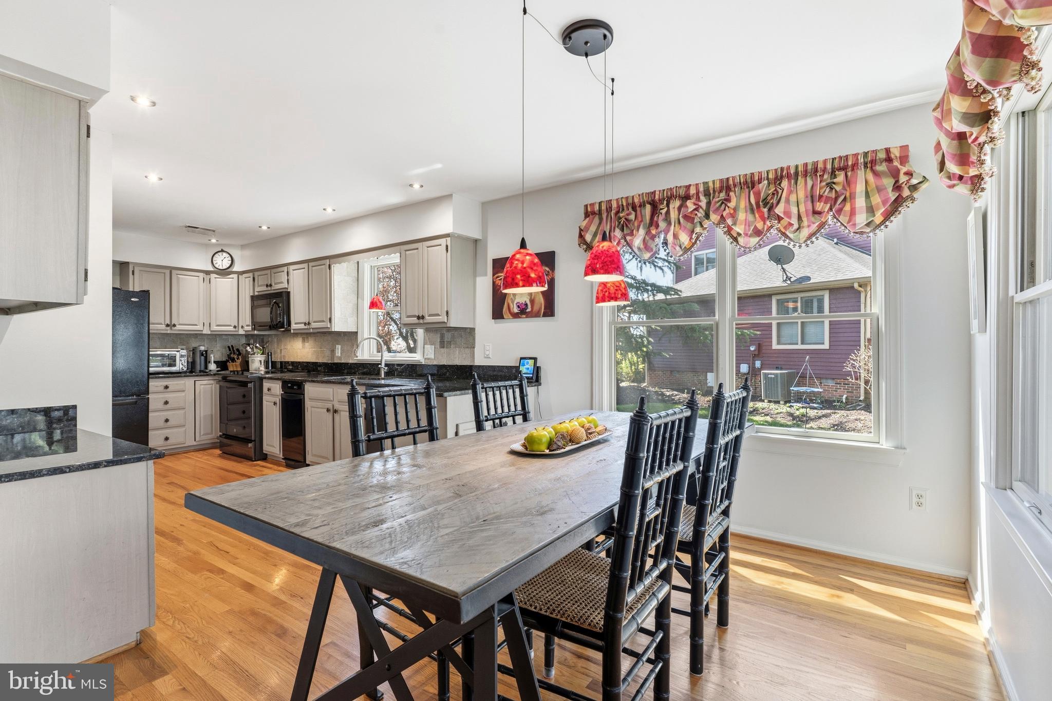 754 Bellefield Road, Unit 103 Solomons, MD 20629 - Photo 8 of 62 a view of a dining area with furniture and window