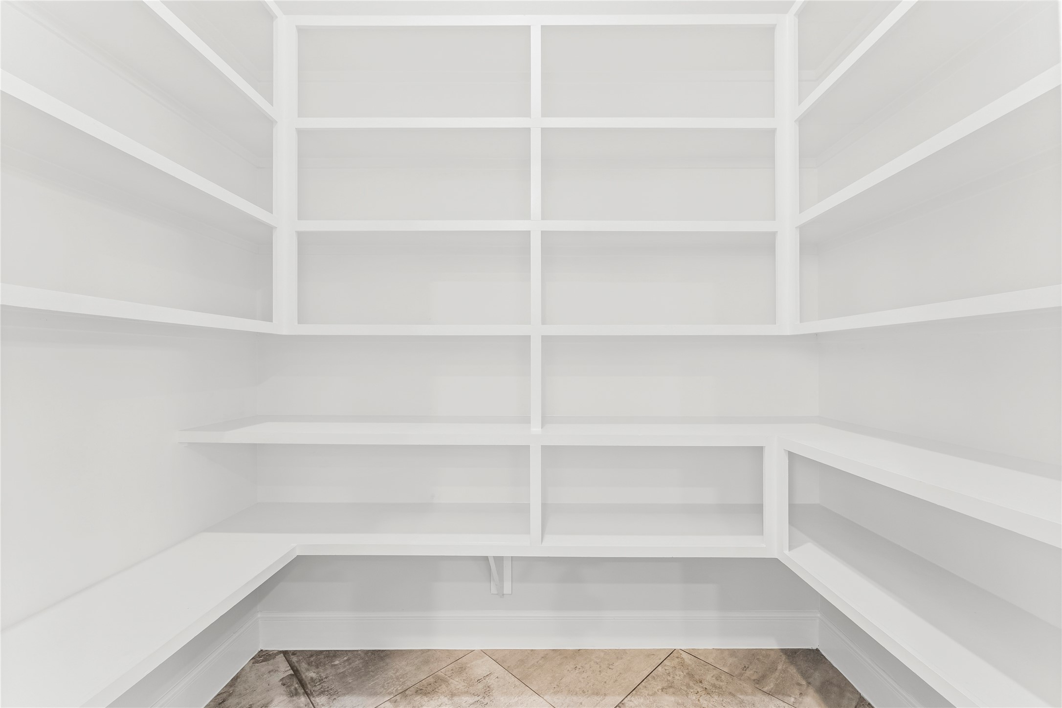 2806 Princeton Street Houston, TX 77009 - Photo 14 of 20 a view of walk in closet with empty racks